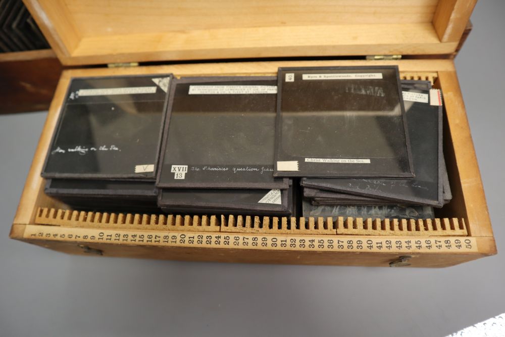 Three boxes of mixed lantern slides